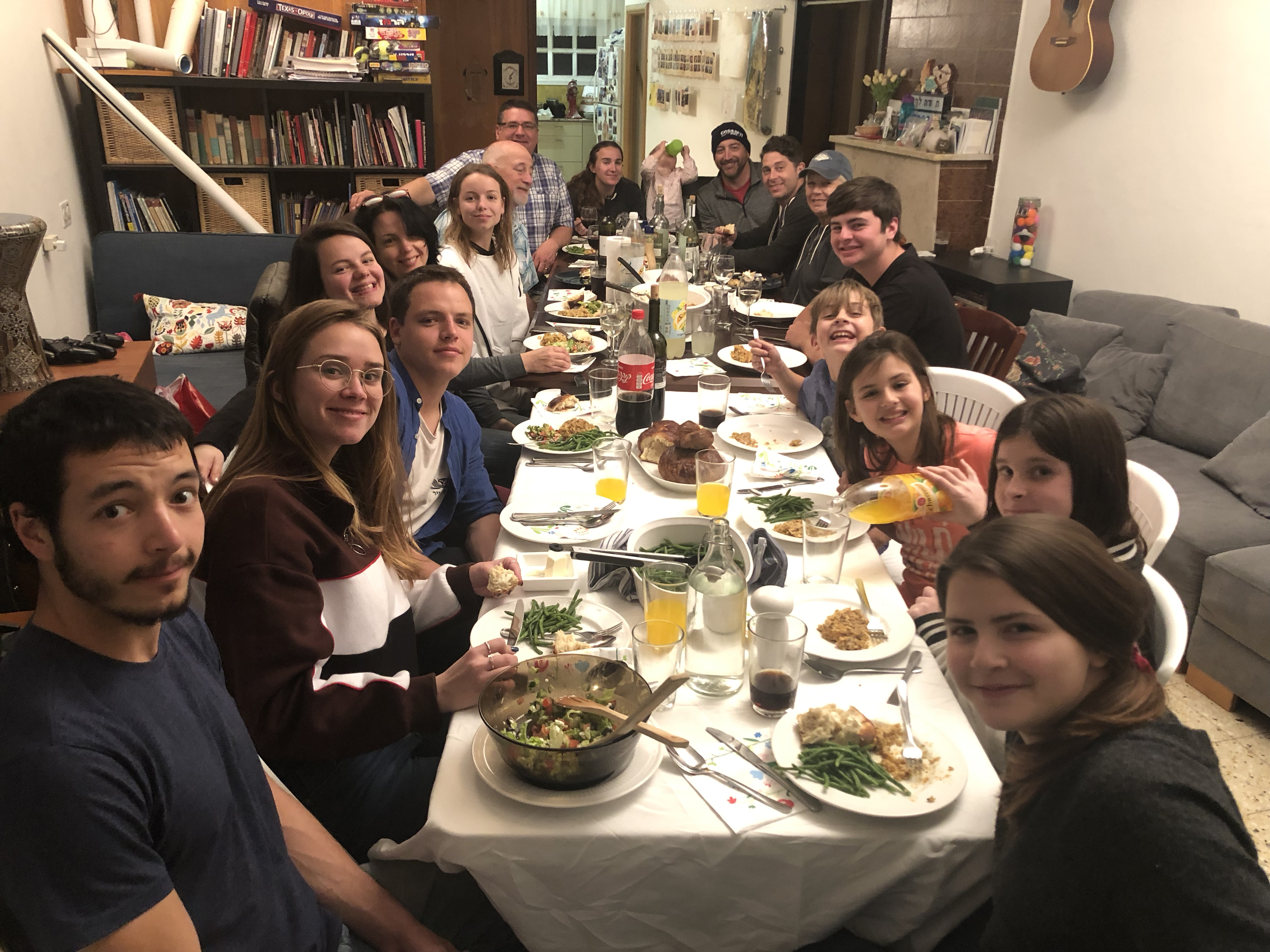 Families over for a Shabbat meal.